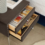 King bed, nightstand - brass studs adorn the headboard