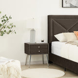 King bed, nightstand - brass studs adorn the headboard