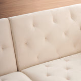 Beige velvet nail head sofa bed with throw pillow and midfoot