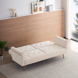 Beige velvet nail head sofa bed with throw pillow and midfoot